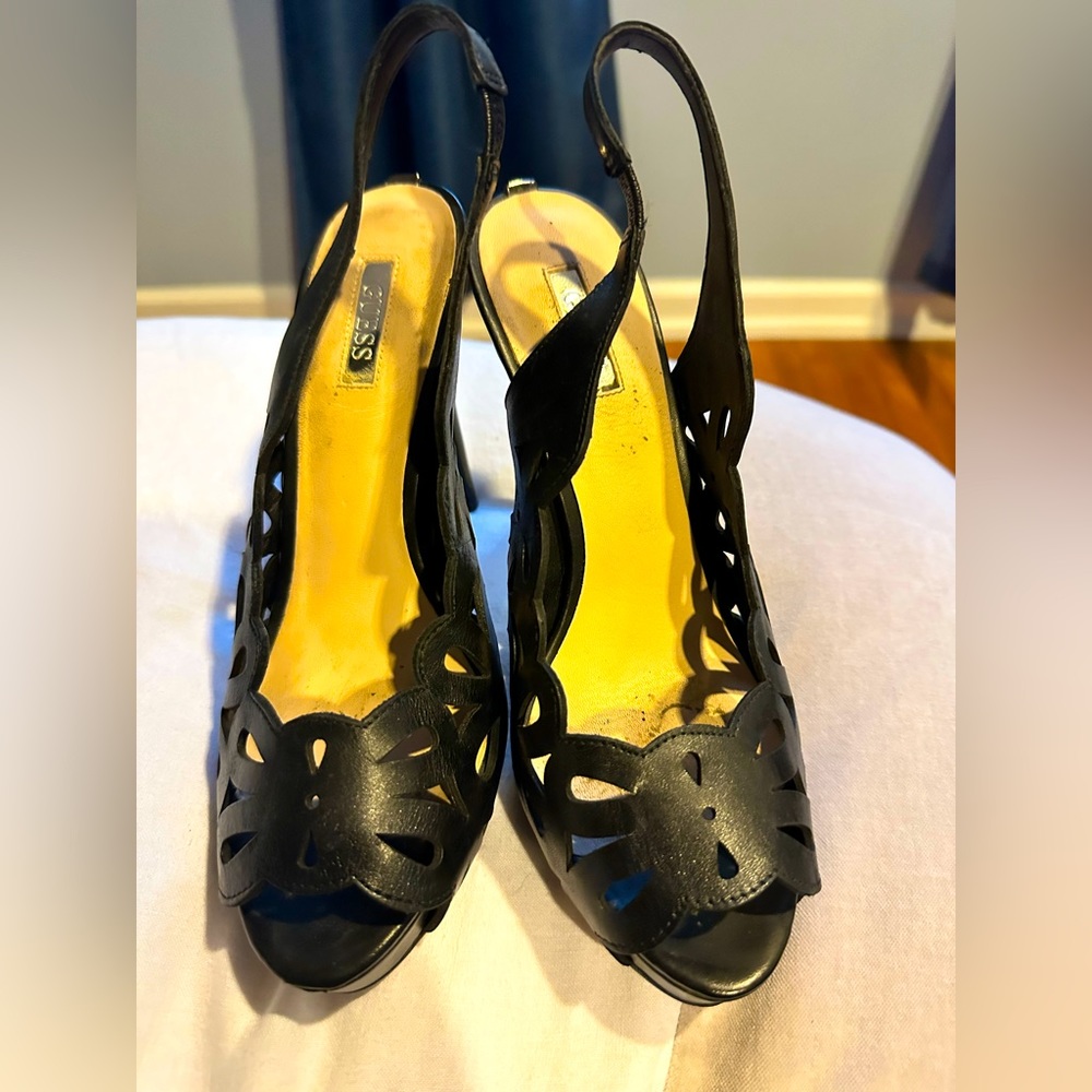 GUESS BLACK LEATHER 4 INCH HEELS. WITH CUT OUTS ON THE LEATHER. WORN ONCE.